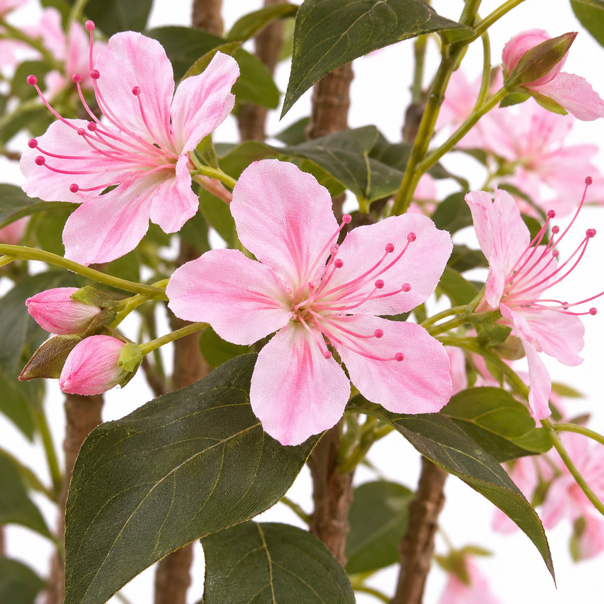 Artificial pink flowering tree with black pot - detail