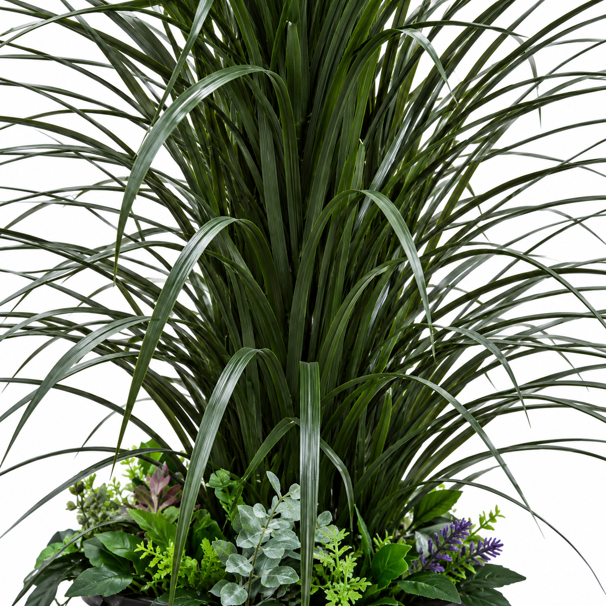 Artificial fountain grass with mixed floral base - closeup